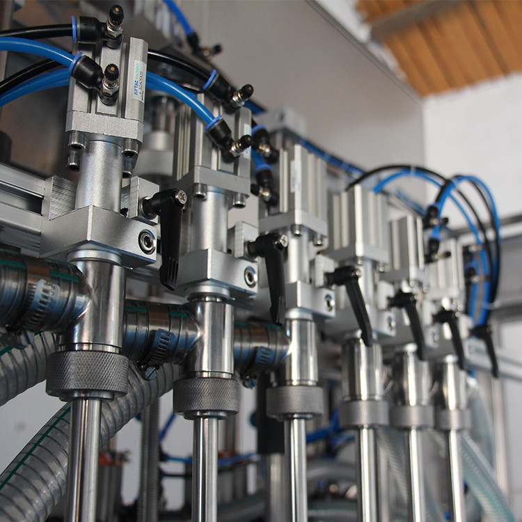 eļļas pudeļu pildīšanas mašīna